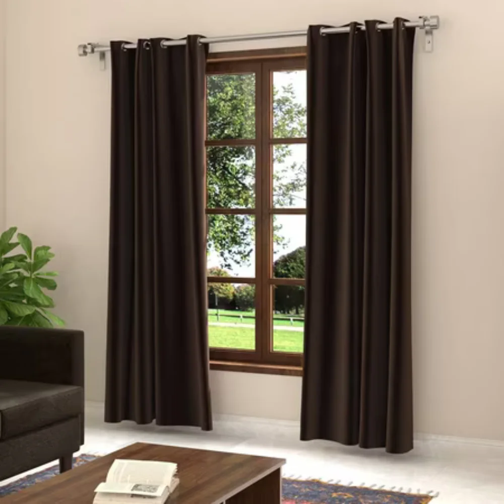 Dark brown curtain covering window in living room Dubai