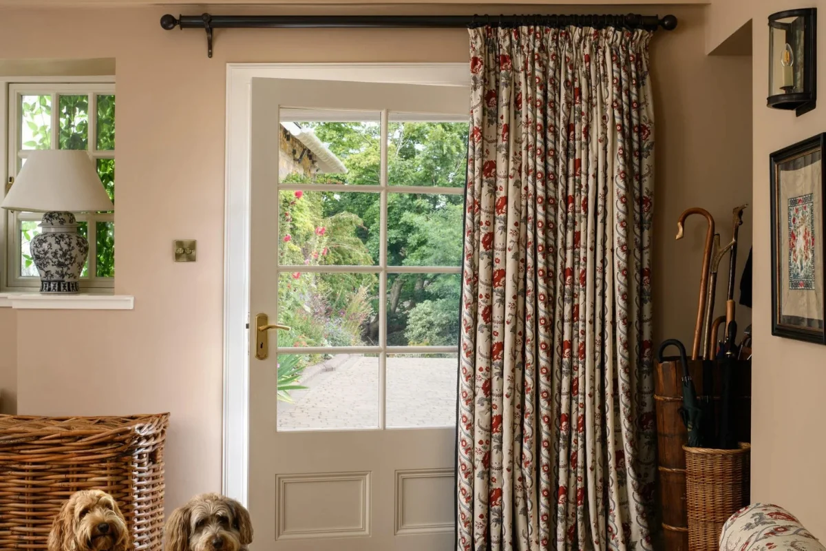 Floral print curtain covering closet door in cozy home