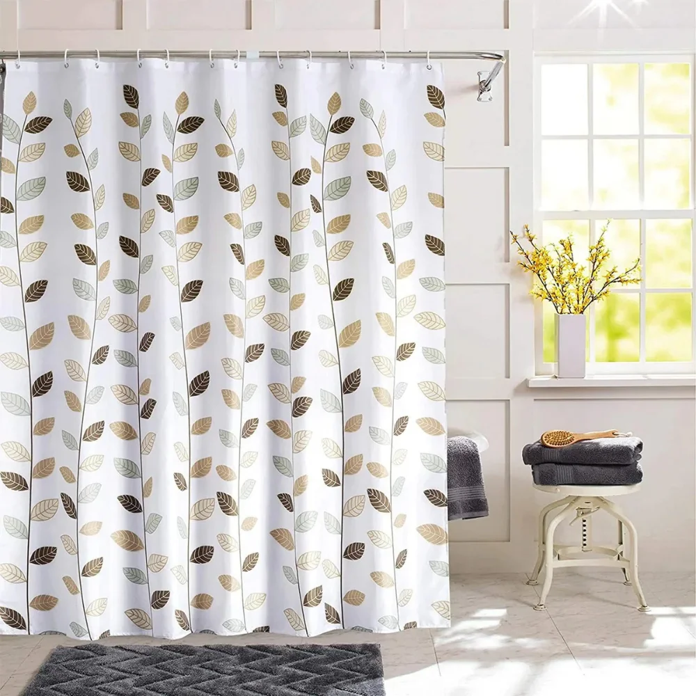 Leaf pattern shower curtain in bright bathroom Dubai