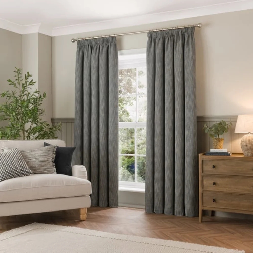Pencil pleat curtains elegant window Dubai