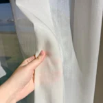 Sheer curtain reception area glass window