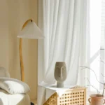 White waffle sheer curtain office window